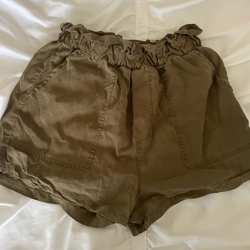 green garage paper bag shorts